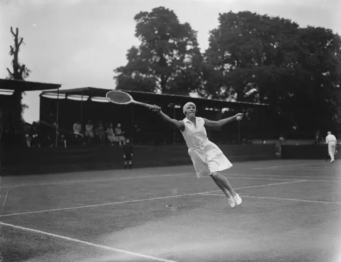 Framed Print : Surrey tennis championship at Surbiton. Miss Tapscott ( South Africa ) makes a leap for the ball Framed Print : Surrey tennis championship at Surbiton. Miss Tapscott ( South Africa ) makes a leap for the ball