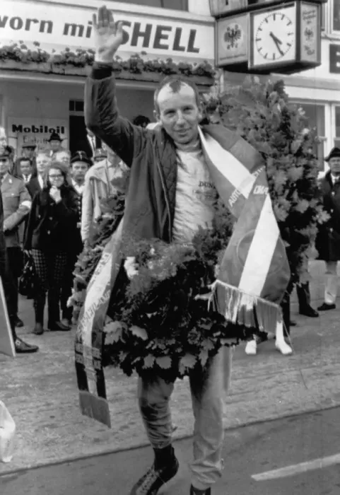 Framed Print : Surtees wins German Grand Prix. Nuerburgring : John Surtees, happy winner of