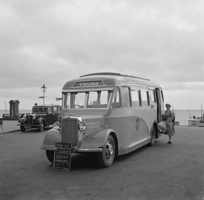 Framed Print : Swanage tour coache on the sea front in Swanage, Dorset. 1936 Framed Print : Swanage tour coache on the sea front in Swanage, Dorset. 1936