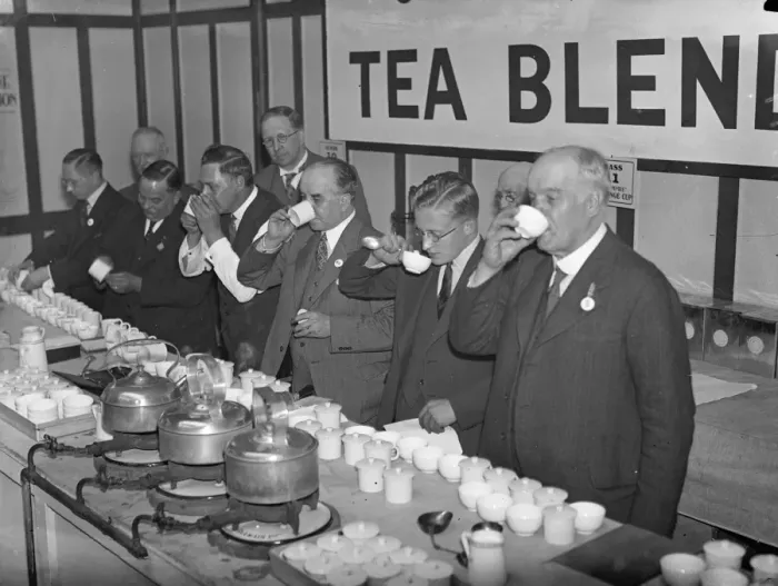 Framed Print : Tea blending competition at grocers exhibition. The tea blending opens to masters