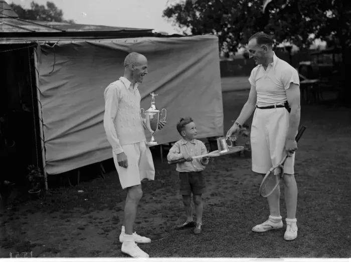 Framed Print : Tennis finalist at Bromley being handed their trophies by a child. 1935 Framed Print : Tennis finalist at Bromley being handed their trophies by a child. 1935