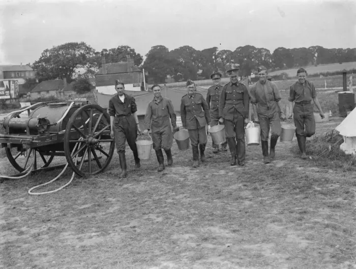 Framed Print : Territorial Army recruits at camp in Chichester, Sussex. Territorials fetching water Framed Print : Territorial Army recruits at camp in Chichester, Sussex. Territorials fetching water