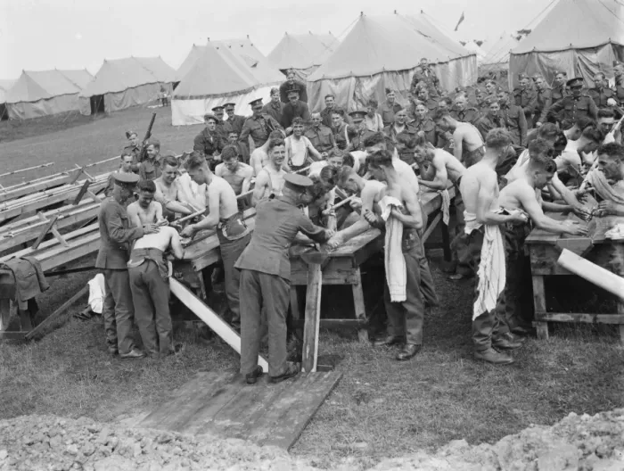 Framed Print : Territorial Army recruits at camp in Lympne, Kent. Washing in the open