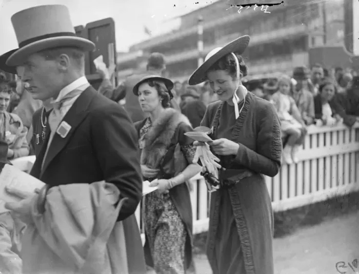 Framed Print : Tied under the chin. A wide, flat straw hat, tied under the chin, worn by woman Framed Print : Tied under the chin. A wide, flat straw hat, tied under the chin, worn by woman