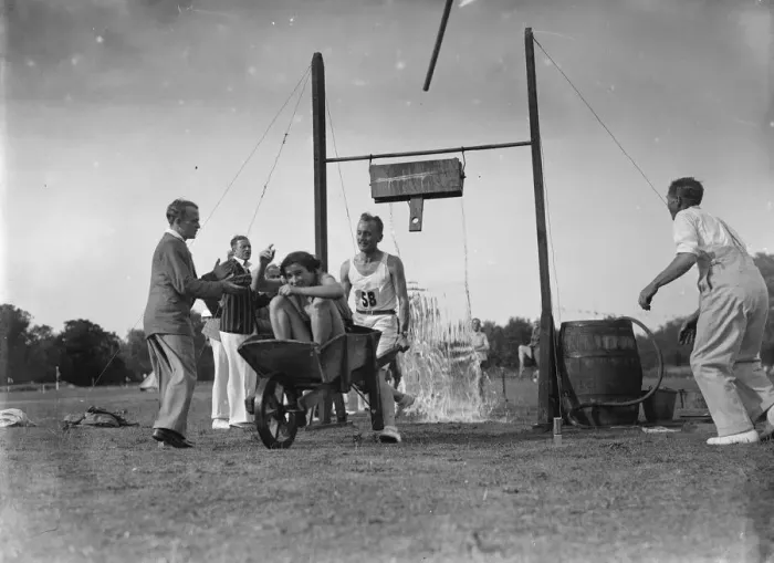 Framed Print : The tlting bucket at a sports day 1935 Framed Print : The tlting bucket at a sports day 1935