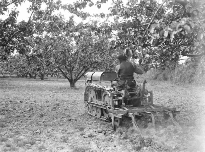 Framed Print : A tractor drawing a harrow on a field at the East Malling Research Station open day