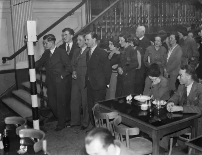 Framed Print : Traffic lights control diners. Lunch hour crowds at Millbank restaurant eat to Stop Framed Print : Traffic lights control diners. Lunch hour crowds at Millbank restaurant eat to Stop