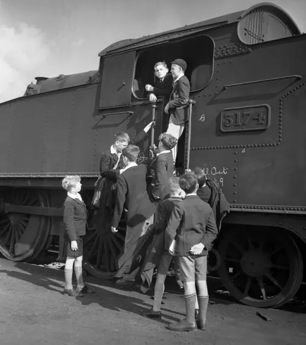 Framed Print : Trainspotters Club outing Young members of the trainspotters club gather around Framed Print : Trainspotters Club outing Young members of the trainspotters club gather around