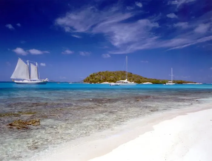Framed Print : TROPICAL ISLANDS Palm Island, in the Grenadines of te west Indies. Beach and boats