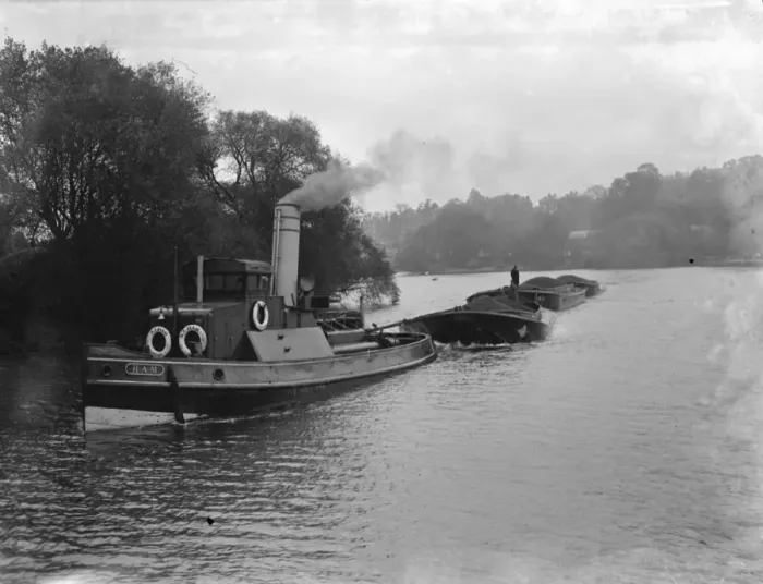 Framed Print : A tug tows barges on the river Thames near Richmond upon Thames. 1936 Framed Print : A tug tows barges on the river Thames near Richmond upon Thames. 1936