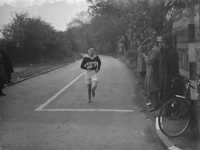 Framed Print : W E Booker, competing in the Kent Marathon, passes through Dartford, Kent Framed Print : W E Booker, competing in the Kent Marathon, passes through Dartford, Kent