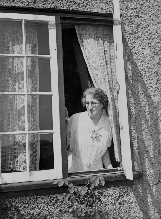 Framed Print : Watching for the bailiffs from her cottag window at Benwick, Isle of Ely, today is