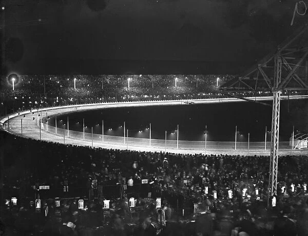 The White City at night, where illuminated greyhound racing attracts average crowd of 75, 000