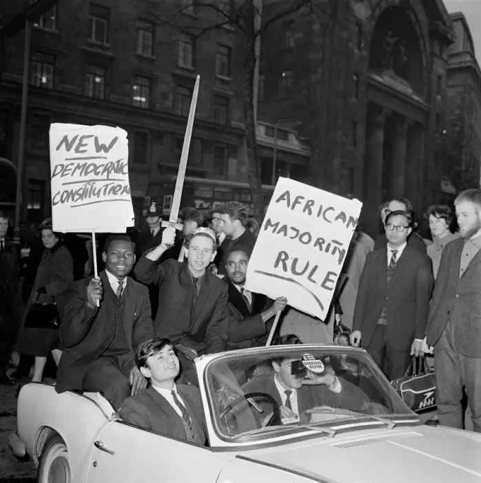 Framed Print : White and coloured students, displaying slogan carrying placards pictured during Framed Print : White and coloured students, displaying slogan carrying placards pictured during