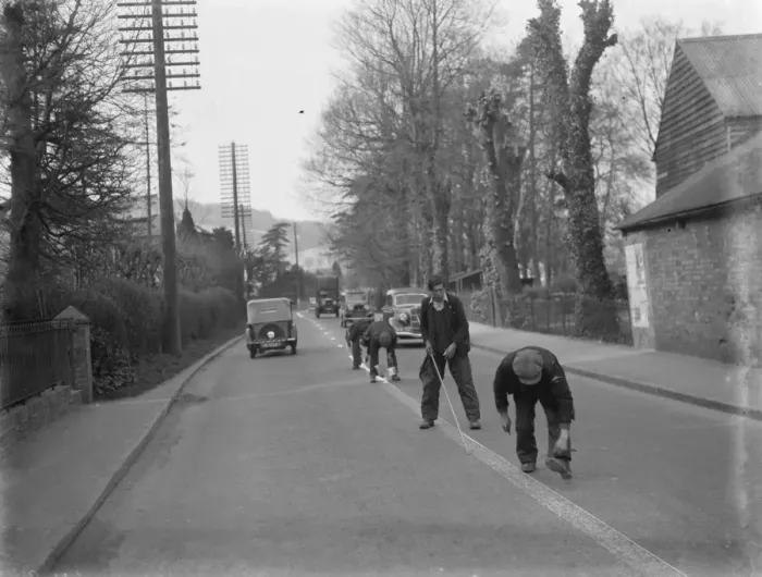 Framed Print : White lines for the narrow Hastings Road. 1937