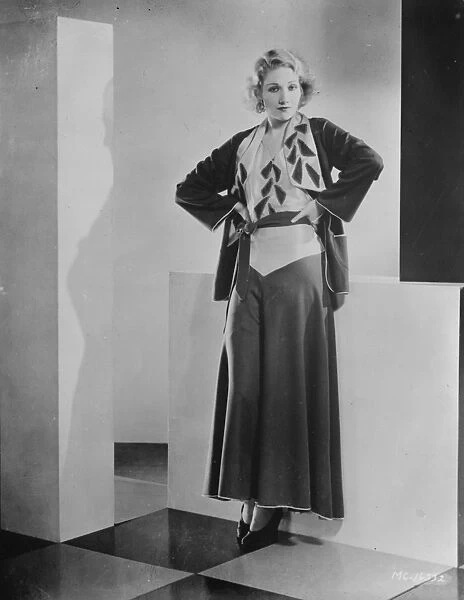 winter fashion Miss Edwina Booth, the film star, in the pyjama suits which will
