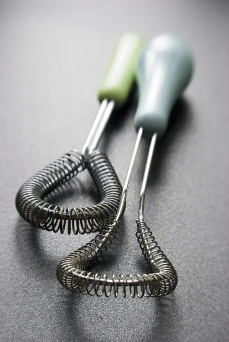 Framed Print : Wire whisks for cookery on dark surface credit: Marie-Louise Avery / thePictureKitchen Framed Print : Wire whisks for cookery on dark surface credit: Marie-Louise Avery / thePictureKitchen