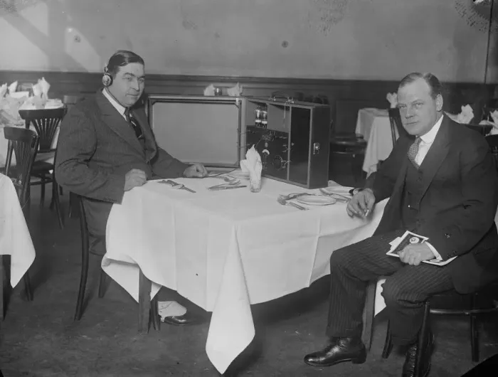 Framed Print : Wireless exhibition at horticultural hall. Commander Kenworthy, M P, listening Framed Print : Wireless exhibition at horticultural hall. Commander Kenworthy, M P, listening