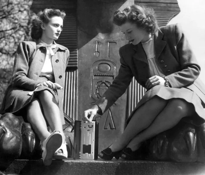 Framed Print : Two women listening to the radio. 1947