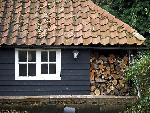 Detail of wooden cottage in Kent, painted with black tar in traditional style