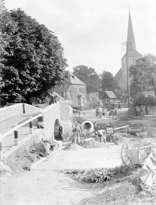 Framed Print : Workers building a ford water crossing by the Eynsford bridge over the River Darent Framed Print : Workers building a ford water crossing by the Eynsford bridge over the River Darent