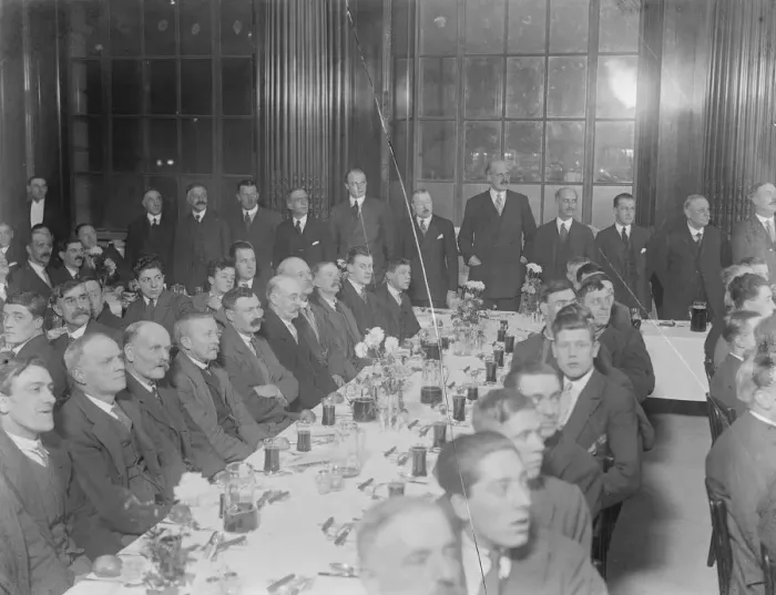Framed Print : Workmen entertained to Christmas dinner in partially completed city building Framed Print : Workmen entertained to Christmas dinner in partially completed city building