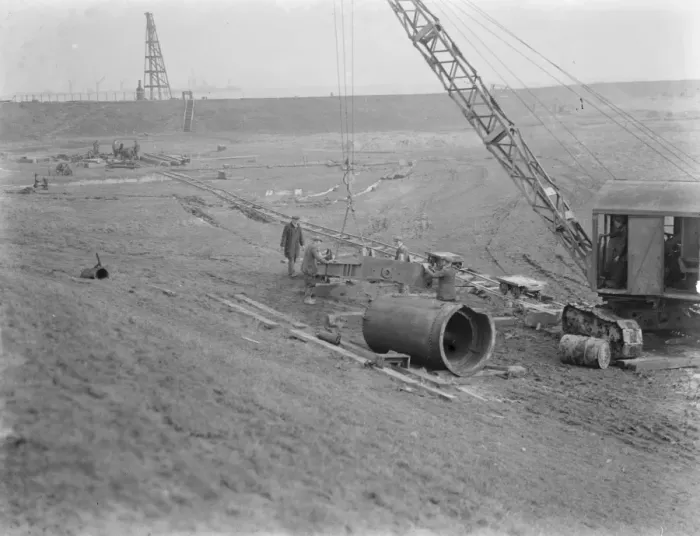 Framed Print : Workmen using a crane for the construction of the Dartford Tunnel. Work begins Framed Print : Workmen using a crane for the construction of the Dartford Tunnel. Work begins