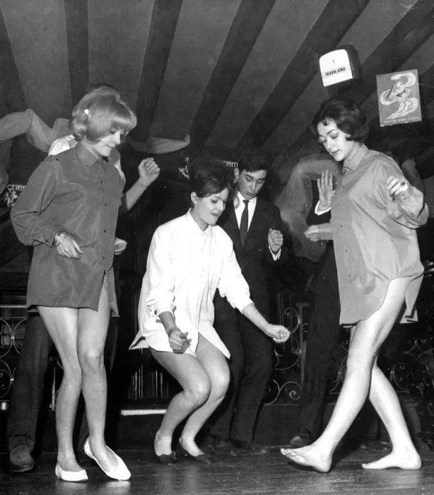 Framed Print : These three young ladies are practicing the newest dance craze, The Twist, while