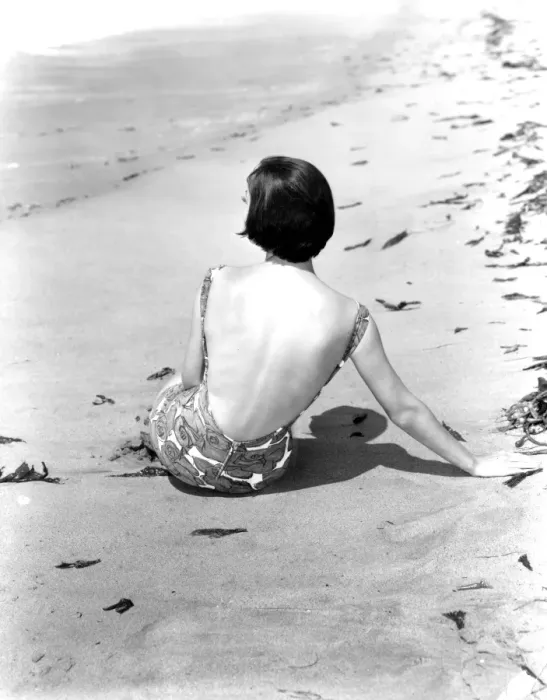 Framed Print : A young woman relaxing on the beach April 1953 Framed Print : A young woman relaxing on the beach April 1953