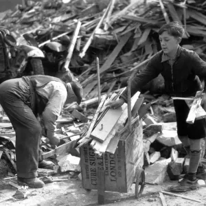 11 year old Lambeth boy sells firewood from bombed houses for Londons War Weapon Week