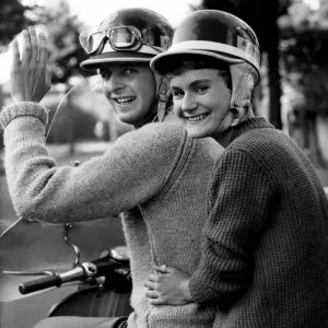 Black and white print of a young man with his girlfriend Black and white print of a young man with his girlfriend