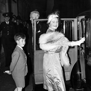 20 October 1956 Prince Charles follows the Queen Mother to their car after watching