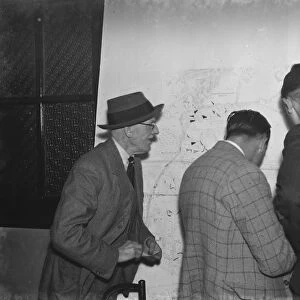 ARP ( Air Raid Precautions ) wardens in Crayford, Kent, looking at maps of the area