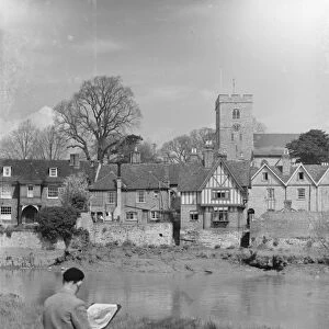 An artist at work by the river at Aylesford, Kent. 1935