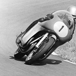 Assen, Holland: Rhodesian Motor-cycling ace, Gary Hocking taking an hairpin bend during the Dutch T