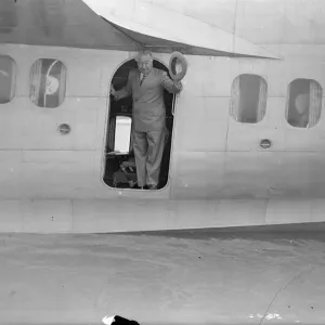 Australian Premier, leaves for Holland by flying boat on way home. Mr J A Lyon s Australian Premier, leaves for Holland by flying boat on way home. Mr J A Lyon s