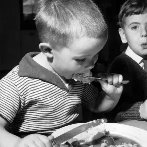 Bobby Mitchell, age 5, in a school dinner print from October 1961 Bobby Mitchell, age 5, in a school dinner print from October 1961