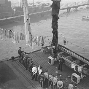 Boys from the Gravesend Sea School, Kent, having hung their washing from the rigging