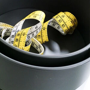 Cake tins and tape measure credit: Marie-Louise Avery / thePictureKitchen / TopFoto