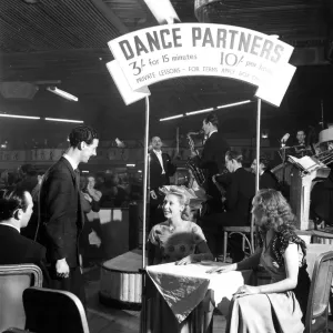 Now its sixty cents a dance; Dance hostesses are back again at the Hammersmith Now its sixty cents a dance; Dance hostesses are back again at the Hammersmith