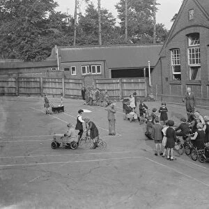 Children receive traffic instructions on the playground of their Sidcup Hill School