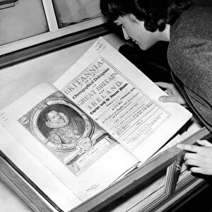 Chislehurst Library Assistant, Miss Gillian Wiles of St Pauls Cray, Kent, admires