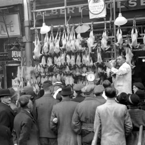 Christmas, 1936. Auctioning the Christmas Turkey. 23 December 1936