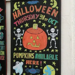 Colourful Blackboard Print with Halloween Pumpkin Advertisement Colourful Blackboard Print with Halloween Pumpkin Advertisement