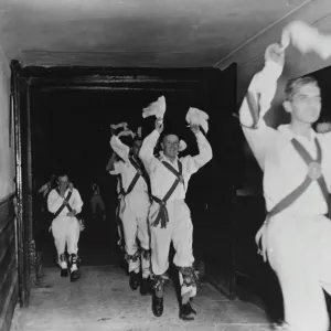 Here Come The Morris Men. After dancing till dark, the Morris men dance their way Here Come The Morris Men. After dancing till dark, the Morris men dance their way