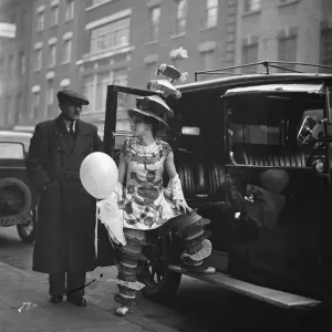 Black and white photograph print of a young woman arriving by taxi Black and white photograph print of a young woman arriving by taxi