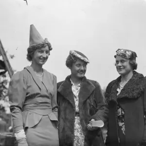 Contrasting hat fashions at free Wimbledon reception. Three of the original Contrasting hat fashions at free Wimbledon reception. Three of the original