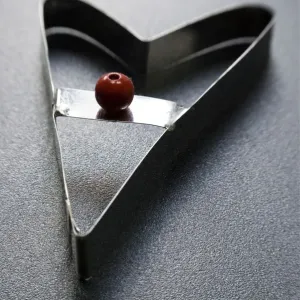 Cookie cutter in modern heart shape with red bead handle credit: Marie-Louise Avery Cookie cutter in modern heart shape with red bead handle credit: Marie-Louise Avery