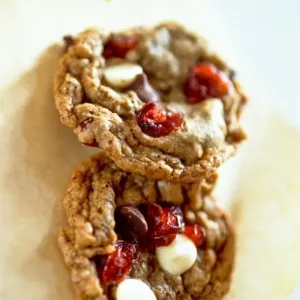 Cranberry and peanut and chocolate chip cookies on greaseproof paper credit: Marie-Louise Cranberry and peanut and chocolate chip cookies on greaseproof paper credit: Marie-Louise