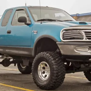 A customized Ford F150 with big wheels and tyres outside a Dairy Queen fast food A customized Ford F150 with big wheels and tyres outside a Dairy Queen fast food